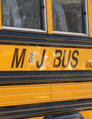 M & J Bus INC logo